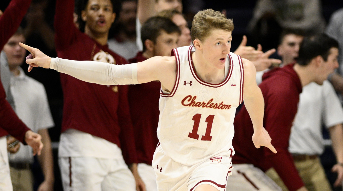 Charleston guard Ryan Larson celebrates a score